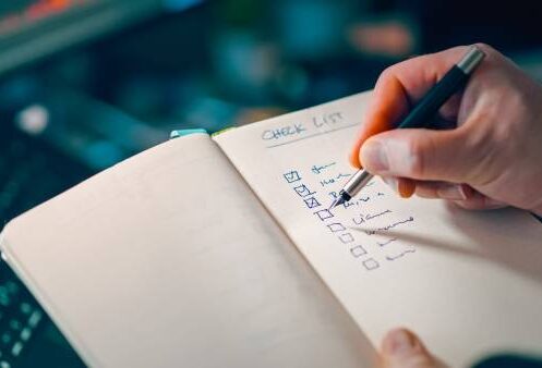checking items off a home maintenance checklist