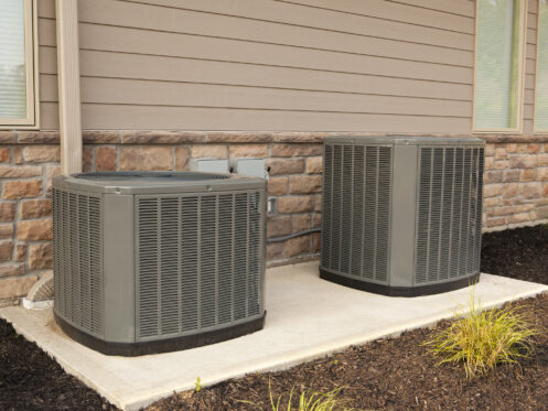 High efficiency heat pumps outside a Belchertown, MA home